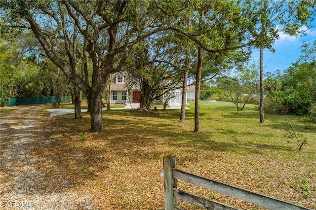 view of yard with fence