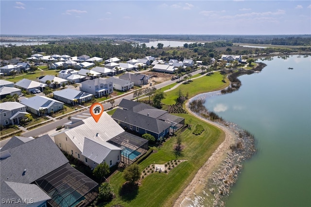 aerial view with a water view and a residential view