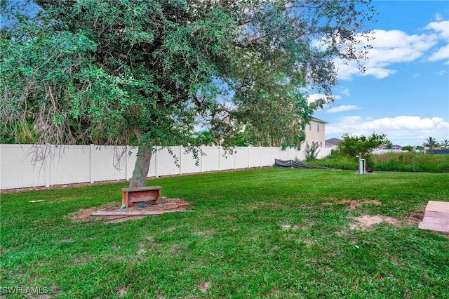 view of yard featuring fence