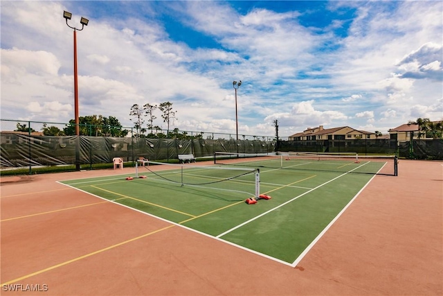 view of sport court with community basketball court and fence