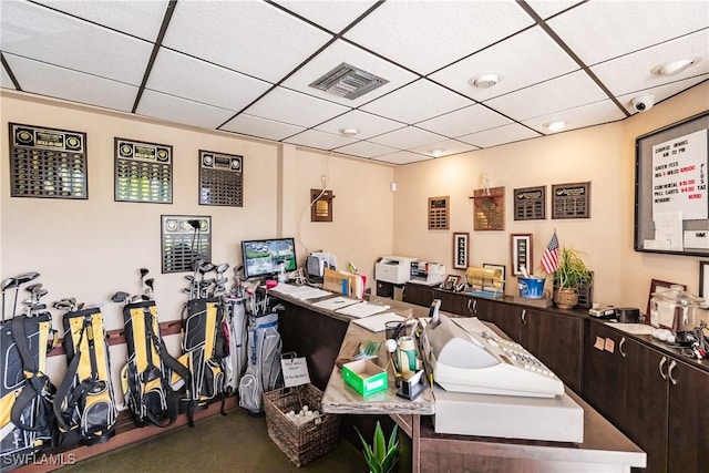 office area featuring a drop ceiling and visible vents