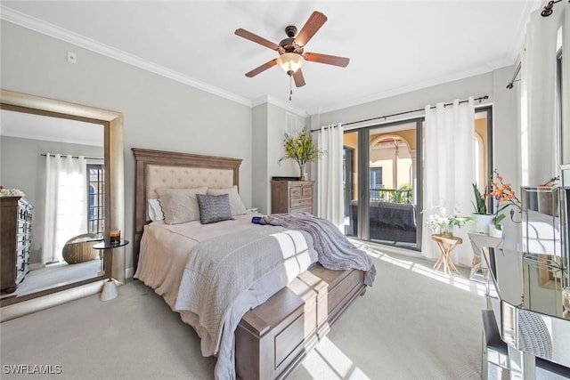 bedroom with light carpet, multiple windows, and access to exterior