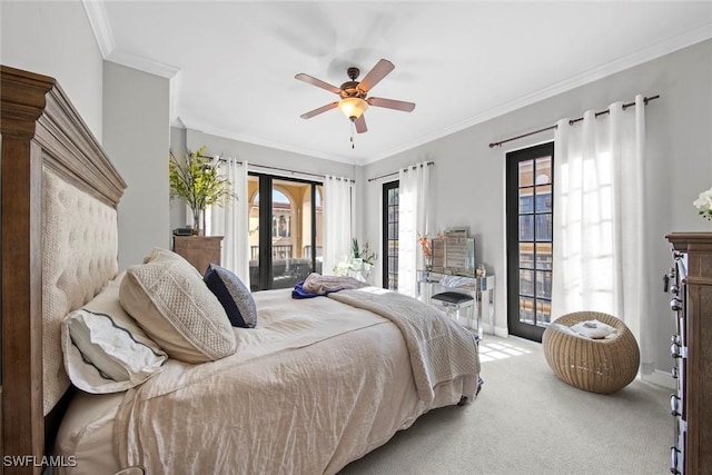 carpeted bedroom featuring a ceiling fan, baseboards, access to exterior, french doors, and ornamental molding