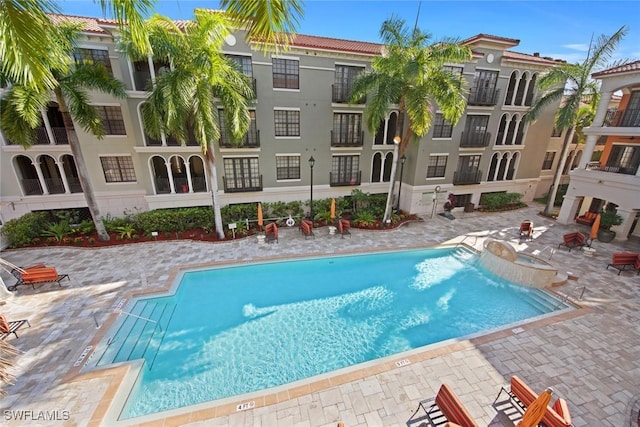 community pool featuring a patio