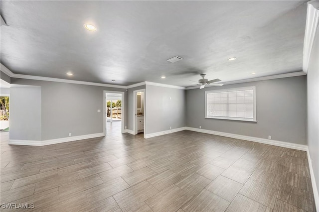 empty room with plenty of natural light, visible vents, baseboards, and ceiling fan