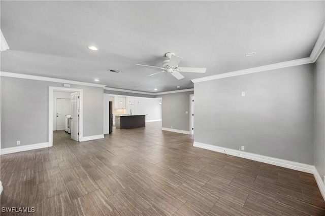 unfurnished living room featuring a ceiling fan, visible vents, baseboards, and dark wood-style floors