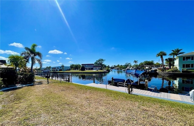 exterior space featuring a water view and a yard