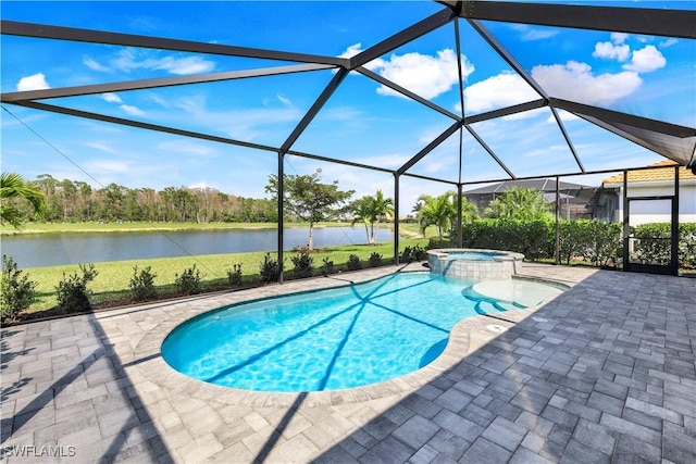 view of pool featuring a yard, a pool with connected hot tub, a water view, a patio area, and a lanai