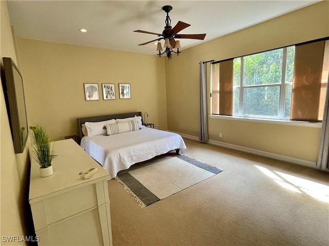 bedroom featuring recessed lighting, a ceiling fan, carpet, and baseboards