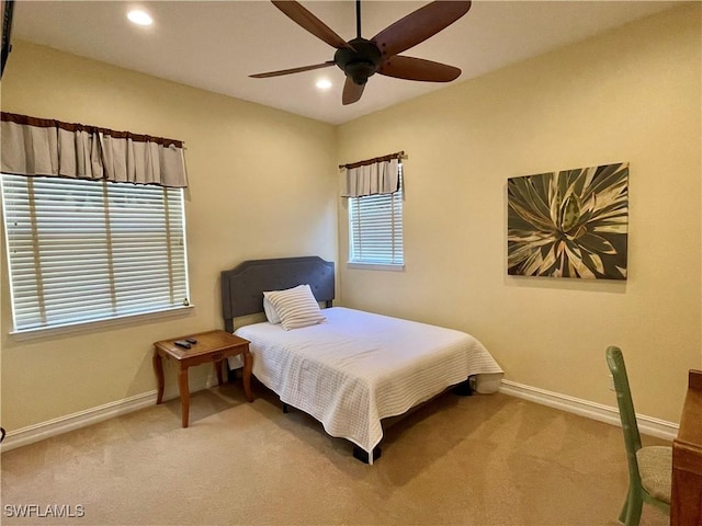 carpeted bedroom featuring recessed lighting, baseboards, and ceiling fan