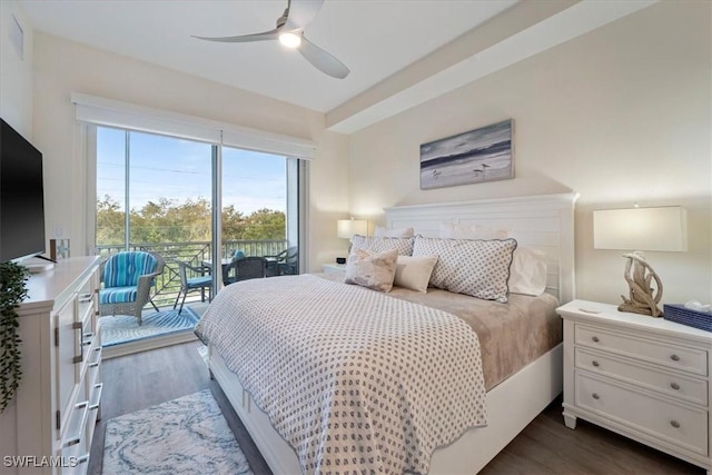 bedroom featuring dark wood-style floors, access to outside, and a ceiling fan