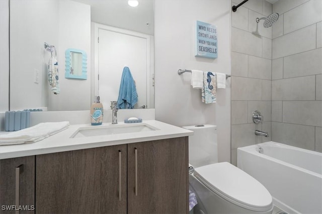 bathroom featuring shower / tub combination, vanity, and toilet