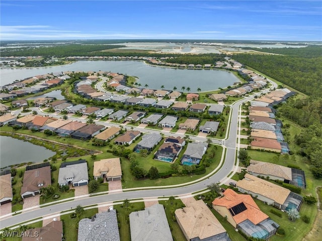 aerial view with a water view and a residential view