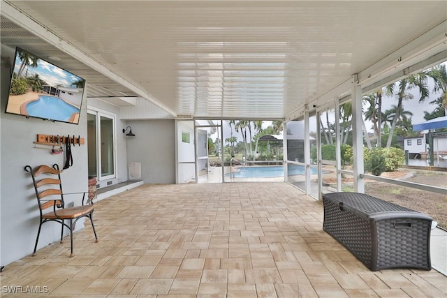 sunroom / solarium featuring a wealth of natural light