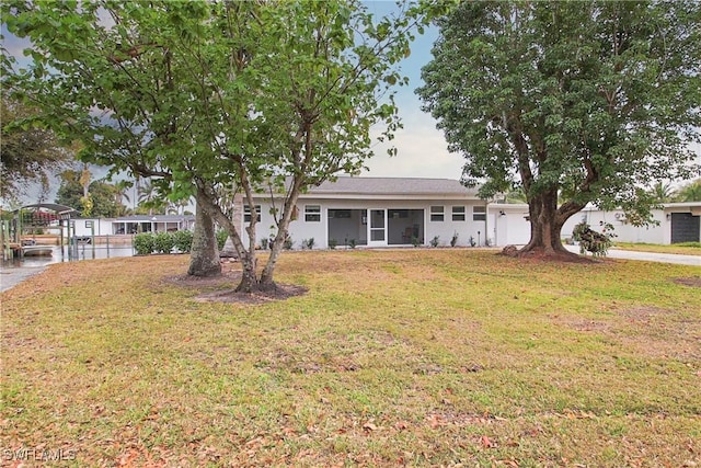 view of front of home with a front lawn