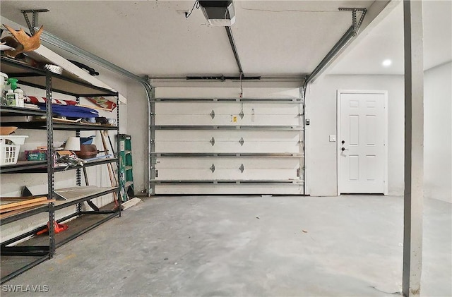 garage featuring a garage door opener