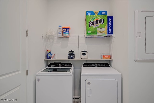 laundry area featuring washer and dryer and laundry area