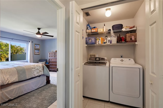 laundry area with visible vents, light tile patterned flooring, ceiling fan, separate washer and dryer, and laundry area