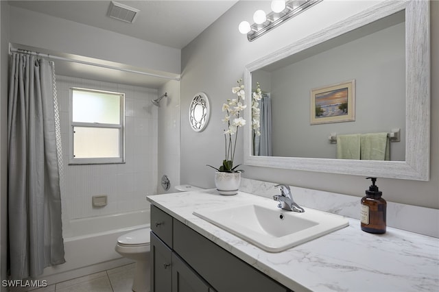 full bathroom with toilet, vanity, visible vents, tile patterned floors, and shower / bath combination with curtain