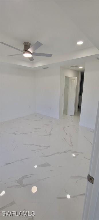 1025 Pilgrim St E, Lehigh Acres, FL 33974 - unfurnished room featuring ceiling fan, light marble finish flooring, and recessed lighting