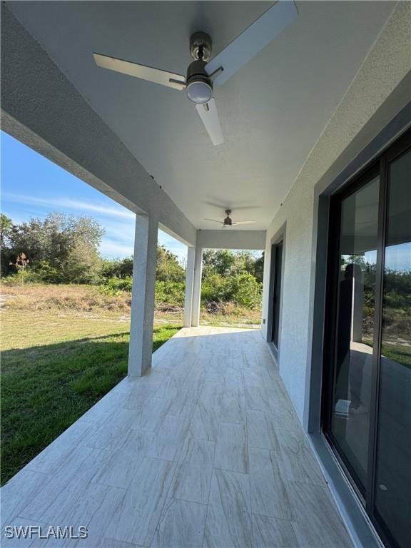 view of patio with a ceiling fan