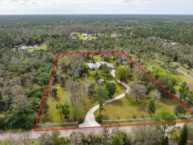 bird's eye view featuring a view of trees