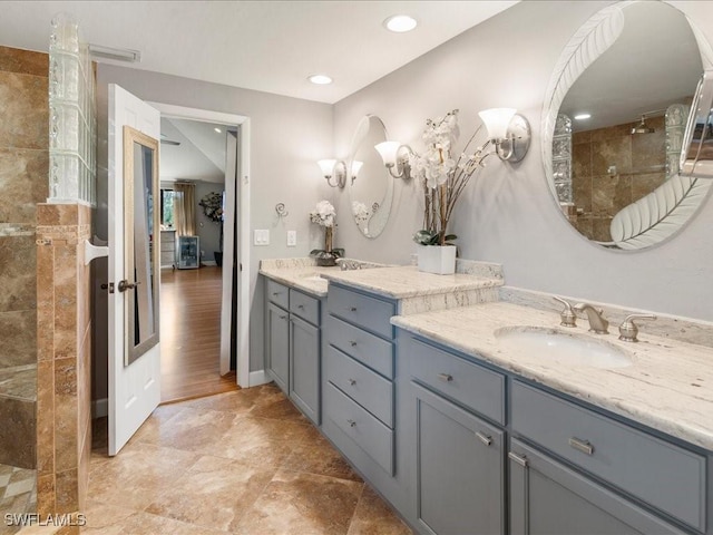 full bathroom with recessed lighting, a walk in shower, vanity, and baseboards