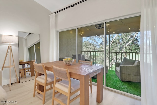 dining space featuring wood finished floors