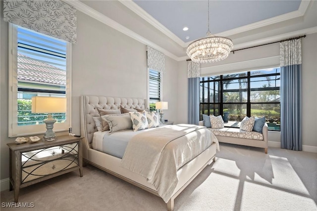 carpeted bedroom with baseboards, a raised ceiling, a notable chandelier, and crown molding