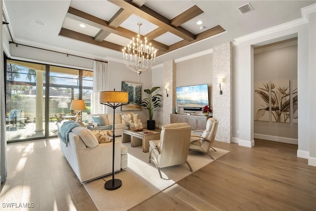 living area featuring baseboards, visible vents, coffered ceiling, wood finished floors, and beam ceiling