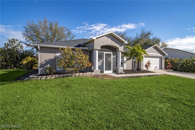 single story home with driveway, a garage, a front lawn, and stucco siding