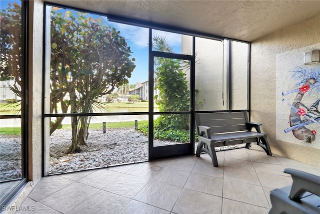 unfurnished sunroom with a wealth of natural light