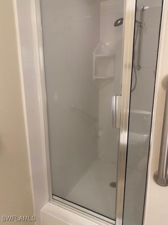 full bathroom with a stall shower