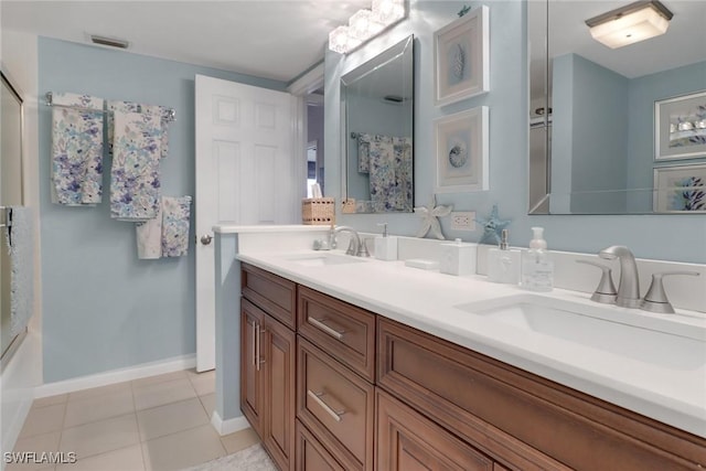 full bathroom featuring tile patterned flooring, visible vents, a sink, and double vanity