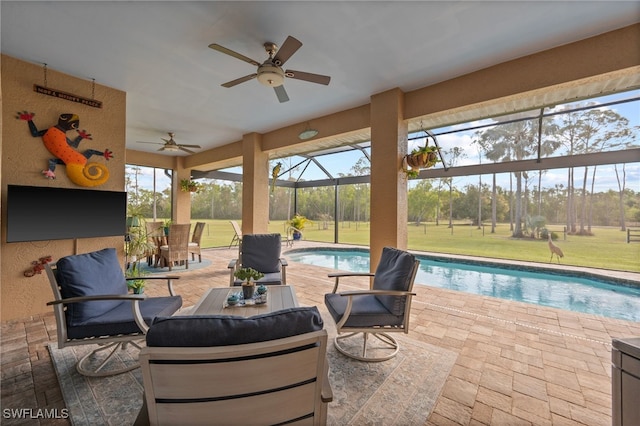 view of patio with outdoor dining area, glass enclosure, an outdoor pool, and ceiling fan