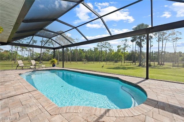 outdoor pool with glass enclosure, a patio, and a yard