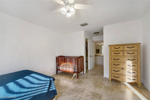 bedroom featuring visible vents, ceiling fan, baseboards, and light tile patterned floors