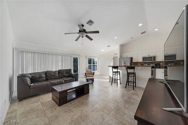 living room featuring recessed lighting, visible vents, light tile patterned flooring, ceiling fan, and high vaulted ceiling