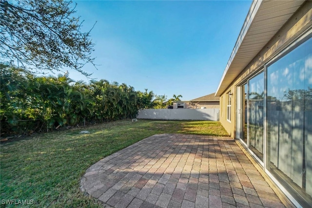 exterior space with a fenced backyard