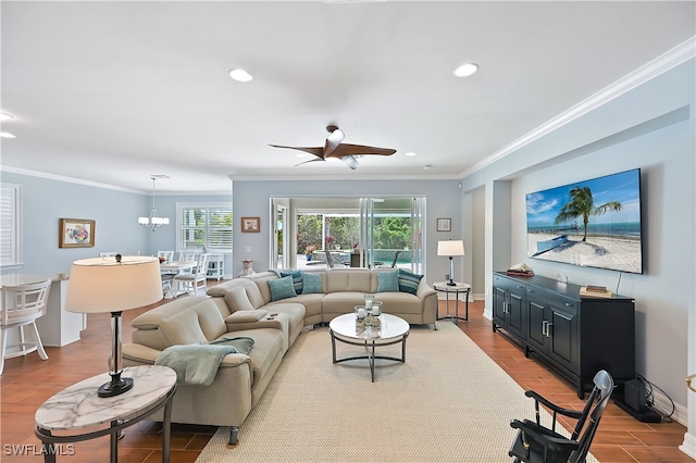 living area with ornamental molding, recessed lighting, and wood finished floors