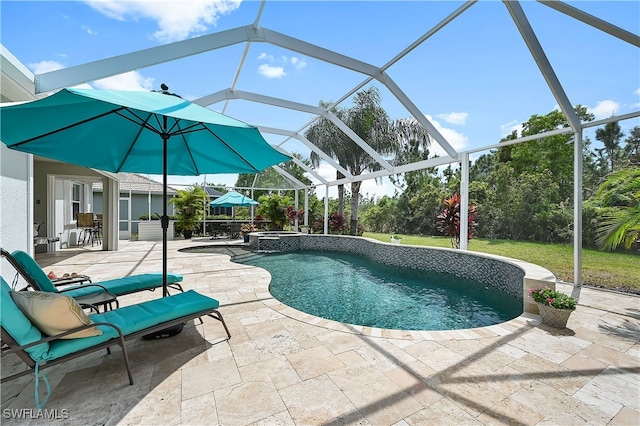 view of swimming pool with a patio area, a lanai, and a pool with connected hot tub