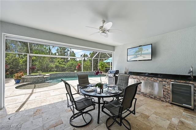 interior space featuring wine cooler and a ceiling fan