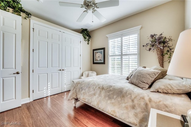 10731 Wintercress Dr, Estero, FL 34135 - bedroom featuring a closet, wood finished floors, and a ceiling fan