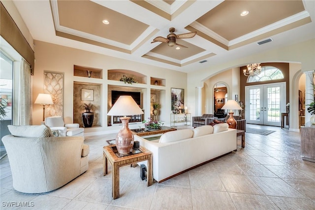 10731 Wintercress Dr, Estero, FL 34135 - living room featuring coffered ceiling, visible vents, arched walkways, and french doors