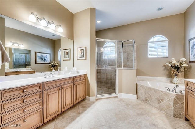 10731 Wintercress Dr, Estero, FL 34135 - bathroom featuring a shower stall, tile patterned flooring, vanity, and a garden tub