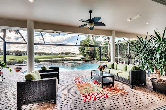 10731 Wintercress Dr, Estero, FL 34135 - view of swimming pool featuring outdoor lounge area, ceiling fan, a lanai, and a patio area