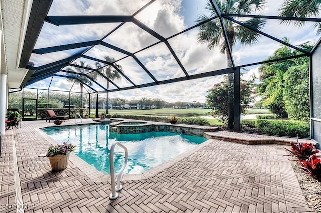 10731 Wintercress Dr, Estero, FL 34135 - view of pool with a pool with connected hot tub, a lanai, and a patio