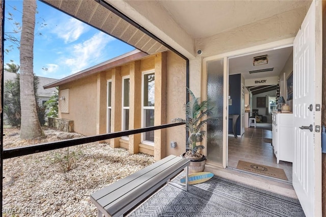 exterior space with stucco siding