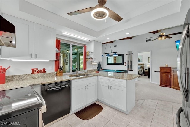 kitchen with electric stove, freestanding refrigerator, white cabinetry, dishwasher, and a peninsula