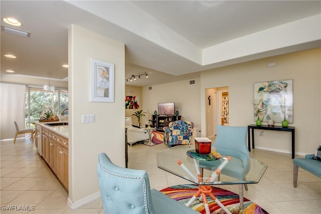 dining area featuring light tile patterned floors, recessed lighting, rail lighting, visible vents, and baseboards